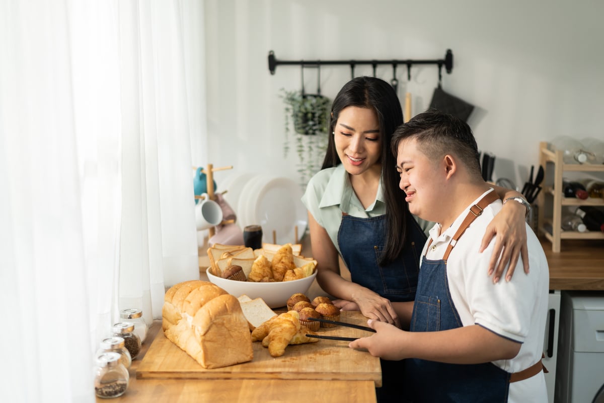 Son with Disability Preparing Breads with Mom